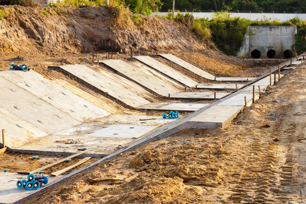 Stacked concrete drainage tile for drainage in yard